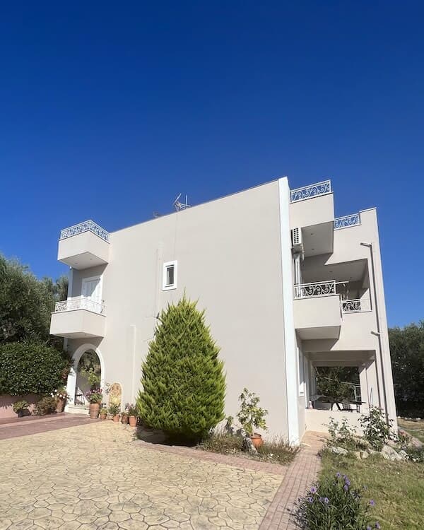 Villa Zoi exterior view with olive trees