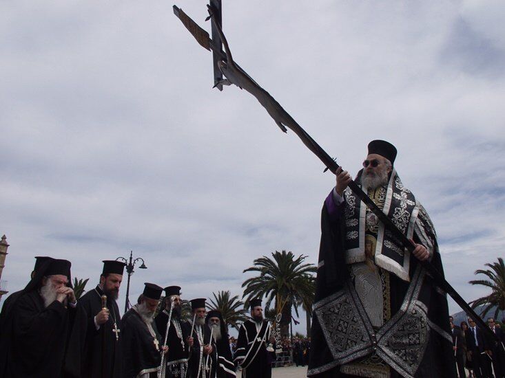 Bishop holding the cross during the Good Friday ceremony in Zakynthos